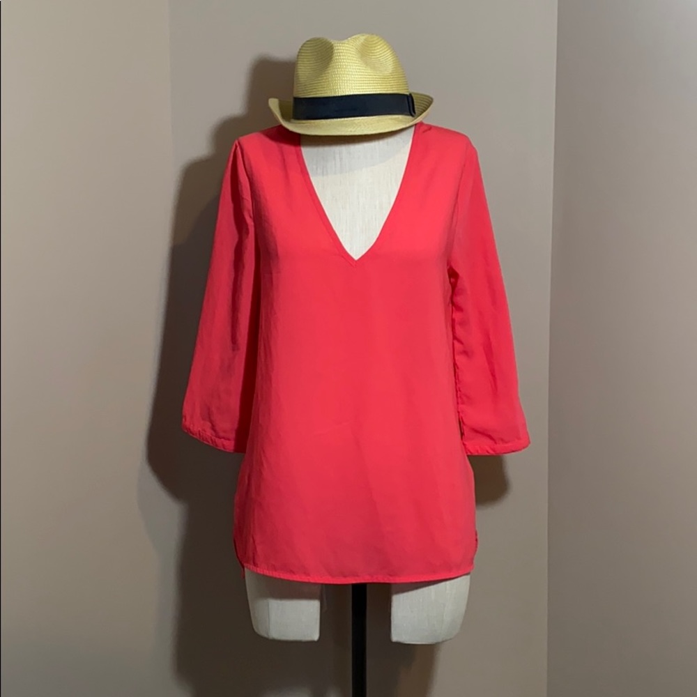 Bright coral blouse